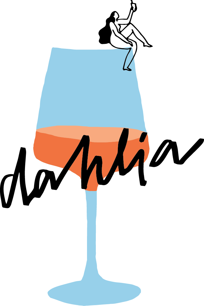 Dahlia background image with Dahlia character sitting on a wine glass and the logo overtop